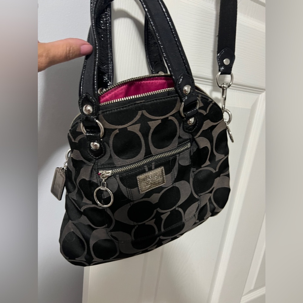 Coach logo purse - black and gray with silver accents. Pink inside.